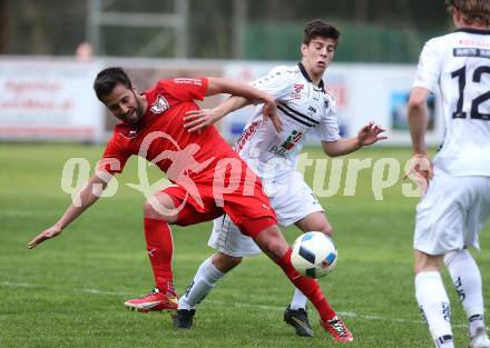Fussball Kaerntner Liga. ATUS Ferlach gegen WAC Amateure. Abian Jose Serrano Davila (Ferlach), Moritz Leitner (WAC). Ferlach, am 13.4.2017.
Foto: Kuess
---
pressefotos, pressefotografie, kuess, qs, qspictures, sport, bild, bilder, bilddatenbank