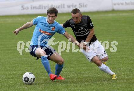 Fussball Kaerntner Liga. Eberstein gegen Gmuend. Ilias Chaschmagamadov, (Eberstein), Sladjan Djurdjevic  (Gmeund). Gmuend, am 3.6.2017.
Foto: Kuess
---
pressefotos, pressefotografie, kuess, qs, qspictures, sport, bild, bilder, bilddatenbank