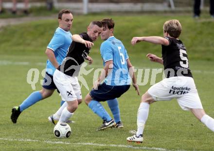 Fussball Kaerntner Liga. Eberstein gegen Gmuend. Antonio Vavpic (Eberstein), Sladjan Djurdjevic  (Gmeund). Gmuend, am 3.6.2017.
Foto: Kuess
---
pressefotos, pressefotografie, kuess, qs, qspictures, sport, bild, bilder, bilddatenbank