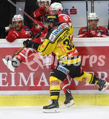 EBEL. Eishockey Bundesliga. KAC gegen 	Vienna Capitals. Jamie Lundmark,  (KAC), Jerry Pollastrone (Vienna Capitals). Klagenfurt, am 15.10.2017.
Foto: Kuess

---
pressefotos, pressefotografie, kuess, qs, qspictures, sport, bild, bilder, bilddatenbank