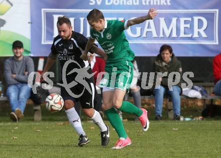Fussball 1. KLasse C. Donau gegen Oberes Metnitztal. Sebastian Michael Layroutz,  (Donau), Marko Petricevic (Metnitztal). Klagenfurt, am 29.10.2017.
Foto: Kuess
---
pressefotos, pressefotografie, kuess, qs, qspictures, sport, bild, bilder, bilddatenbank