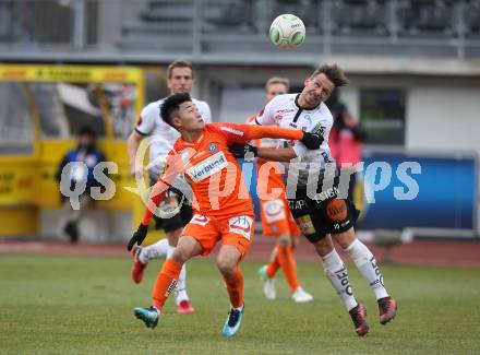 Fussball Tipico Bundesliga. RZ Pellets WAC gegen FK Austria Wien. Daniel Offenbacher, (WAC), Jinhyun Lee (Wien). Wolfsberg, am 26.11.2017.
Foto: Kuess

---
pressefotos, pressefotografie, kuess, qs, qspictures, sport, bild, bilder, bilddatenbank