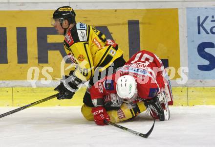 EBEL. Eishockey Bundesliga. KAC gegen  Vienna Capitals. Kevin Kapstad,  (KAC), Mario Fischer (Vienna Capitals). Klagenfurt, am 22.12.2017.
Foto: Kuess

---
pressefotos, pressefotografie, kuess, qs, qspictures, sport, bild, bilder, bilddatenbank