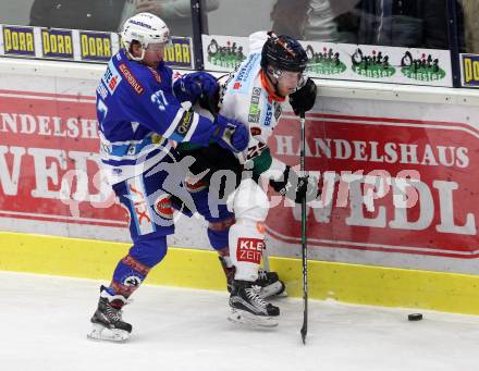 EBEL. Eishockey Bundesliga. EC VSV gegen Moser Medical Graz99ers. Christof Kromp,  (VSV), Jonathan Carlsson (Graz). Villach, am 1.1.2018.
Foto: Kuess 


---
pressefotos, pressefotografie, kuess, qs, qspictures, sport, bild, bilder, bilddatenbank