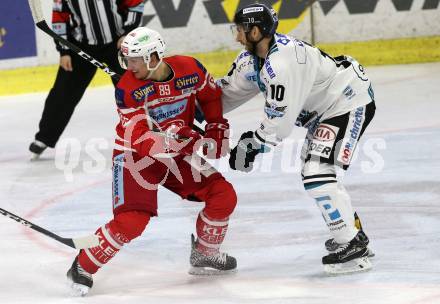 EBEL. Eishockey Bundesliga. KAC gegen 	EHC Liwest Black Wings Linz. Marco Brucker,  (KAC), Marc-Andre Dorion (Linz). Klagenfurt, am 21.1.2018.
Foto: Kuess

---
pressefotos, pressefotografie, kuess, qs, qspictures, sport, bild, bilder, bilddatenbank