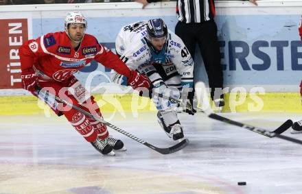 EBEL. Eishockey Bundesliga. KAC gegen 	EHC Liwest Black Wings Linz. Andrew Jacob Kozek,  (KAC), Mario Altmann (Linz). Klagenfurt, am 21.1.2018.
Foto: Kuess

---
pressefotos, pressefotografie, kuess, qs, qspictures, sport, bild, bilder, bilddatenbank