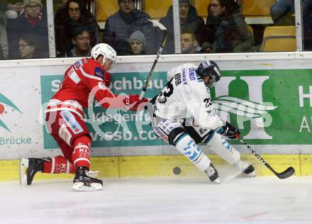 EBEL. Eishockey Bundesliga. KAC gegen 	EHC Liwest Black Wings Linz. Stefan Espeland, (KAC), Fabio Hofer  (Linz). Klagenfurt, am 21.1.2018.
Foto: Kuess

---
pressefotos, pressefotografie, kuess, qs, qspictures, sport, bild, bilder, bilddatenbank