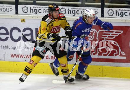 EBEL. Eishockey Bundesliga. EC VSV gegen Vienna Capitals. Valentin Leiler, (VSV), Julian Grosslercher  (Vienna Capitals). Villach, am 26.1.2018.
Foto: Kuess 


---
pressefotos, pressefotografie, kuess, qs, qspictures, sport, bild, bilder, bilddatenbank