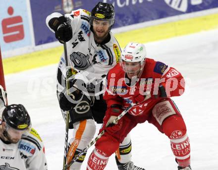 EBEL. Eishockey Bundesliga. KAC gegen 	Dornbirn Bulldogs. Jonathan Rheault,  (KAC), Michael Caruso (Dornbirn). Klagenfurt, am 26.1.2018.
Foto: Kuess

---
pressefotos, pressefotografie, kuess, qs, qspictures, sport, bild, bilder, bilddatenbank