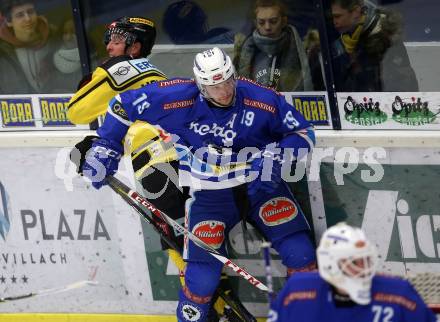 EBEL. Eishockey Bundesliga. EC VSV gegen Vienna Capitals. Stefan Bacher,  (VSV), Riley Holzapfel (Vienna Capitals). Villach, am 26.1.2018.
Foto: Kuess 


---
pressefotos, pressefotografie, kuess, qs, qspictures, sport, bild, bilder, bilddatenbank