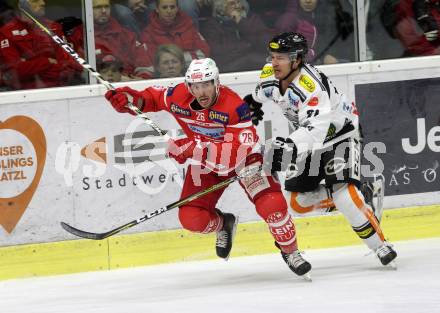 EBEL. Eishockey Bundesliga. KAC gegen 	Dornbirn Bulldogs. Jonathan Rheault,  (KAC), Brodie Reid (Dornbirn). Klagenfurt, am 26.1.2018.
Foto: Kuess

---
pressefotos, pressefotografie, kuess, qs, qspictures, sport, bild, bilder, bilddatenbank