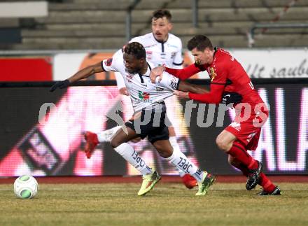 Fussball tipico Bundesliga. RZ Pellets WAC gegen Cashpoint SCR Altach. Issiaka Ouedraogo (WAC) Andreas Lienhart (Altach). Wolfsberg, am 3.2.2018.
Foto: Kuess

---
pressefotos, pressefotografie, kuess, qs, qspictures, sport, bild, bilder, bilddatenbank