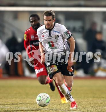 Fussball tipico Bundesliga. RZ Pellets WAC gegen Cashpoint SCR Altach. Thomas Zuendel (WAC), Louis Clement Ngwat Mahop (Altach). Wolfsberg, am 3.2.2018.
Foto: Kuess

---
pressefotos, pressefotografie, kuess, qs, qspictures, sport, bild, bilder, bilddatenbank