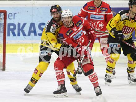 EBEL. Eishockey Bundesliga. KAC gegen 	Vienna Capitals. Jonathan Rheault (KAC), Philippe Lakos (Vienna Capitals). Klagenfurt, am 28.2.2018.
Foto: Kuess

---
pressefotos, pressefotografie, kuess, qs, qspictures, sport, bild, bilder, bilddatenbank