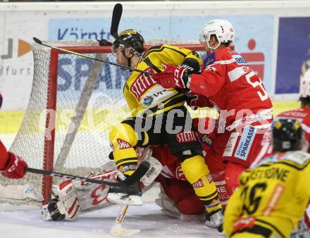 EBEL. Eishockey Bundesliga. KAC gegen 	Vienna Capitals. Mitja Robar,  (KAC), Rafael Rotter (Vienna Capitals). Klagenfurt, am 28.2.2018.
Foto: Kuess

---
pressefotos, pressefotografie, kuess, qs, qspictures, sport, bild, bilder, bilddatenbank