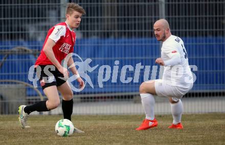 Fussball Kaerntner Liga. SAK gegen Spittal. Zan Kolar (SAK), Ralph Roman Scheer (Spittal). Klagenfurt, am 23.3.2018.
Foto: Kuess
---
pressefotos, pressefotografie, kuess, qs, qspictures, sport, bild, bilder, bilddatenbank