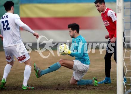 Fussball Kaerntner Liga. SAK gegen Spittal. Stephan Buergler (SAK), Florian Heindl (Spittal). Klagenfurt, am 23.3.2018.
Foto: Kuess
---
pressefotos, pressefotografie, kuess, qs, qspictures, sport, bild, bilder, bilddatenbank