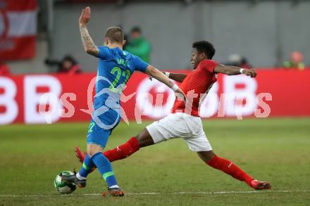 Fussball Laenderspiel. Oesterreich gegen Slowenien.Come together. Sport baut Bruecken. David Alaba,  (Oesterreich), Martin Milec (Slowienien). Klagenfurt, am 23.3.2018.
Foto: Kuess

---
pressefotos, pressefotografie, kuess, qs, qspictures, sport, bild, bilder, bilddatenbank