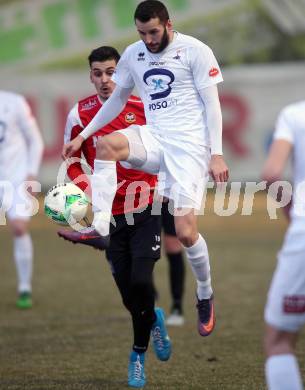 Fussball Kaerntner Liga. SAK gegen Spittal. Enis Durkovic (SAK), Mario Dadic (Spittal). Klagenfurt, am 23.3.2018.
Foto: Kuess
---
pressefotos, pressefotografie, kuess, qs, qspictures, sport, bild, bilder, bilddatenbank