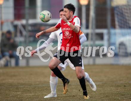 Fussball Kaerntner Liga. SAK gegen Spittal. Darjan Aleksic,  (SAK), Dejan Kecanovic (Spittal). Klagenfurt, am 23.3.2018.
Foto: Kuess
---
pressefotos, pressefotografie, kuess, qs, qspictures, sport, bild, bilder, bilddatenbank