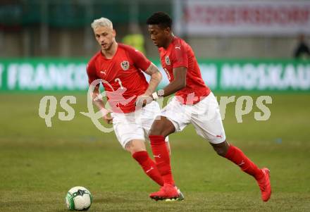 Fussball Laenderspiel. Oesterreich gegen Slowenien.Come together. Sport baut Bruecken.  Marko Arnautovic, David Alaba (Oesterreich). Klagenfurt, am 23.3.2018.
Foto: Kuess

---
pressefotos, pressefotografie, kuess, qs, qspictures, sport, bild, bilder, bilddatenbank
