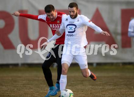 Fussball Kaerntner Liga. SAK gegen Spittal. Enis Durkovic (SAK), Mario Dadic (Spittal). Klagenfurt, am 23.3.2018.
Foto: Kuess
---
pressefotos, pressefotografie, kuess, qs, qspictures, sport, bild, bilder, bilddatenbank