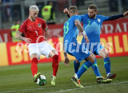 Fussball Laenderspiel. Oesterreich gegen Slowenien.Come together. Sport baut Bruecken. Marko Arnautovic,   (Oesterreich), Aljaz Struna, Nejc Skubic (Slowienien). Klagenfurt, am 23.3.2018.
Foto: Kuess

---
pressefotos, pressefotografie, kuess, qs, qspictures, sport, bild, bilder, bilddatenbank