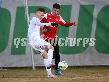Fussball Kaerntner Liga. SAK gegen Spittal. Jurinic Andrej (SAK), Mario Dadic (Spittal). Klagenfurt, am 23.3.2018.
Foto: Kuess
---
pressefotos, pressefotografie, kuess, qs, qspictures, sport, bild, bilder, bilddatenbank