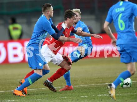 Fussball Laenderspiel. Oesterreich gegen Slowenien.Come together. Sport baut Bruecken.  Julian Baumgartlinger,  (Oesterreich), Josip Ilicic, Kevin Kampl (Slowienien). Klagenfurt, am 23.3.2018.
Foto: Kuess

---
pressefotos, pressefotografie, kuess, qs, qspictures, sport, bild, bilder, bilddatenbank