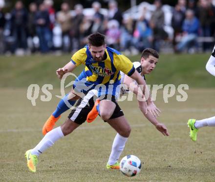 Fussball 2. Klasse A. Lurnfeld gegen Muehldorf. Marco Krassnitzer, (Lurnfeld),  Fabian Tobias Eder  (Muehldorf). Moellbruecke, am 1.4.2018.
Foto: Kuess
---
pressefotos, pressefotografie, kuess, qs, qspictures, sport, bild, bilder, bilddatenbank