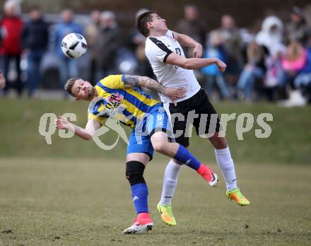 Fussball 2. Klasse A. Lurnfeld gegen Muehldorf. Benjamin Friedrich Josef Maier	, (Lurnfeld),   Fabian Tobias Eder (Muehldorf). Moellbruecke, am 1.4.2018.
Foto: Kuess
---
pressefotos, pressefotografie, kuess, qs, qspictures, sport, bild, bilder, bilddatenbank