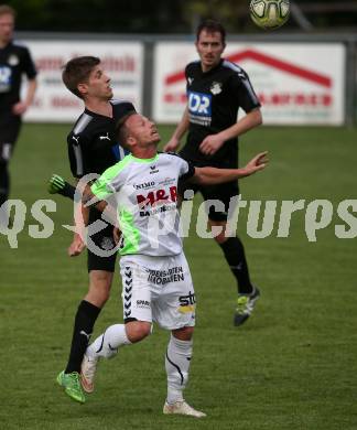 Fussball Kaerntner Liga. Bleiburg gegen Feldkirchen. Mathias Huber,   (Bleiburg), Michael Kulnik (Feldkirchen). Bleiburg, am 28.4.2018.
Foto: Kuess
---
pressefotos, pressefotografie, kuess, qs, qspictures, sport, bild, bilder, bilddatenbank