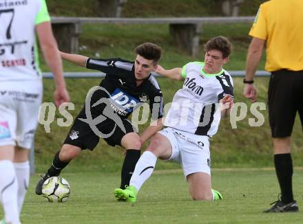 Fussball Kaerntner Liga. Bleiburg gegen Feldkirchen.  Adnan Fajic,  (Bleiburg), Robert Thomas Tiffner (Feldkirchen). Bleiburg, am 28.4.2018.
Foto: Kuess
---
pressefotos, pressefotografie, kuess, qs, qspictures, sport, bild, bilder, bilddatenbank