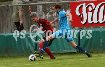 Fussball. Kaerntner Liga. St. Jakob Ros. gegen ATSV Wolfsberg. Christoph Omann, (St. Jakob), Patrick Marzi  (Wolfsberg). St. Jakob, 12.5.2018.
Foto: Kuess
---
pressefotos, pressefotografie, kuess, qs, qspictures, sport, bild, bilder, bilddatenbank