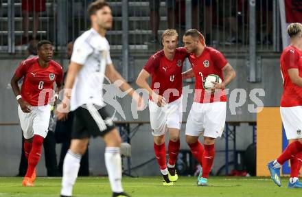 Fussball Laenderspiel. Oesterreich gegen Deutschland. Torjubel David Alaba, Martin Hinteregger, Marko Arnautovic (Oesterreich). Klagenfurt Woerthersee Stadion, am 2.6.2018.
Foto: Kuess


---
pressefotos, pressefotografie, kuess, qs, qspictures, sport, bild, bilder, bilddatenbank