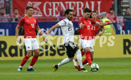 Fussball Laenderspiel. Oesterreich gegen Deutschland. Florian Grillitsch, Alessandro Schoepf, (Oesterreich),  Ilkay Guendogan  (Deutschland). Klagenfurt Woerthersee Stadion, am 2.6.2018.
Foto: Kuess


---
pressefotos, pressefotografie, kuess, qs, qspictures, sport, bild, bilder, bilddatenbank