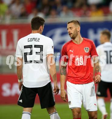 Fussball Laenderspiel. Oesterreich gegen Deutschland. Guido Burgstaller,  (Oesterreich), Mario Gomez (Deutschland). Klagenfurt Woerthersee Stadion, am 2.6.2018.
Foto: Kuess


---
pressefotos, pressefotografie, kuess, qs, qspictures, sport, bild, bilder, bilddatenbank