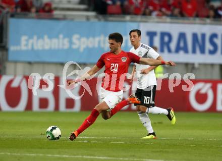 Fussball Laenderspiel. Oesterreich gegen Deutschland. Florian Grillitsch, (Oesterreich),  Mesut Oezil  (Deutschland). Klagenfurt Woerthersee Stadion, am 2.6.2018.
Foto: Kuess


---
pressefotos, pressefotografie, kuess, qs, qspictures, sport, bild, bilder, bilddatenbank