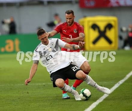 Fussball Laenderspiel. Oesterreich gegen Deutschland. Aleksandar Dragovic, (Oesterreich), Niklas Suele  (Deutschland). Klagenfurt Woerthersee Stadion, am 2.6.2018.
Foto: Kuess


---
pressefotos, pressefotografie, kuess, qs, qspictures, sport, bild, bilder, bilddatenbank