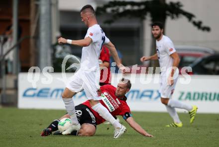 Fussball. Kaerntner Liga. SAK gegen St. Michael/Bleiburg. Zoran Vukovic,  (SAK), Samo Bernhard Olip  (St. Michael). Klagenfurt, 3.8.2018.
Foto: Kuess
---
pressefotos, pressefotografie, kuess, qs, qspictures, sport, bild, bilder, bilddatenbank