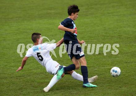 Fussball Schuelerliga. Bundesmeisterschaft. Finale. BG/BRG/SRG Klagenfurt-Lerchenfeld U13 gegen NSMS 10 Wendstattgasse U13. Marco Modritsch,  (Lerchenfeld), Efe Arac (Wendstattgasse). Landskron, am 28.6.2018.
Foto: Kuess
---
pressefotos, pressefotografie, kuess, qs, qspictures, sport, bild, bilder, bilddatenbank