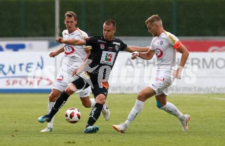 Fussball tipico Bundesliga. RZ Pellets WAC gegen FK Austria Wien.  Sasa Jovanovic, (WAC),  Florian Klein, Alexander Gruenwald (Austria Wien). Wolfsberg, am 5.8.2018.
Foto: Kuess

---
pressefotos, pressefotografie, kuess, qs, qspictures, sport, bild, bilder, bilddatenbank