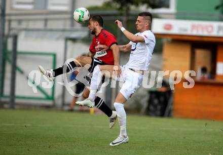 Fussball. Kaerntner Liga. SAK gegen St. Michael/Bleiburg. Zoran Vukovic,  (SAK), Ziga Mrevlje  (St. Michael). Klagenfurt, 3.8.2018.
Foto: Kuess
---
pressefotos, pressefotografie, kuess, qs, qspictures, sport, bild, bilder, bilddatenbank