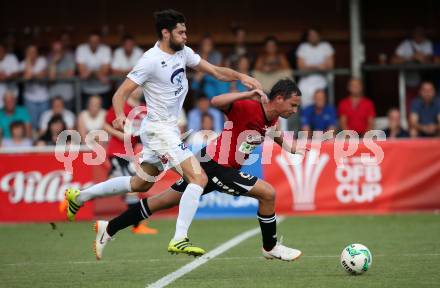 Fussball. Kaerntner Liga. SAK gegen St. Michael/Bleiburg. Stephan Buergler, (SAK), Herbert Skubel   (St. Michael). Klagenfurt, 3.8.2018.
Foto: Kuess
---
pressefotos, pressefotografie, kuess, qs, qspictures, sport, bild, bilder, bilddatenbank