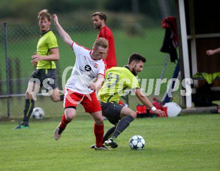 Fussball. Kaerntner Liga. Lind gegen Woelfnitz. Peter Stojanovic (Lind),  Andreas Walcher (Woelfnitz). Lind, 18.8.2018.
Foto: Kuess
---
pressefotos, pressefotografie, kuess, qs, qspictures, sport, bild, bilder, bilddatenbank