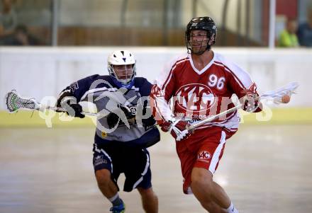 Lacrosse. KAC gegen Vienna Monarchs Lacrosse. Ronald Zaumanis, (KAC),  Jan Fink (Vienna). Klagenfurt, am 12.8.2018.
Foto: Kuess
---
pressefotos, pressefotografie, kuess, qs, qspictures, sport, bild, bilder, bilddatenbank