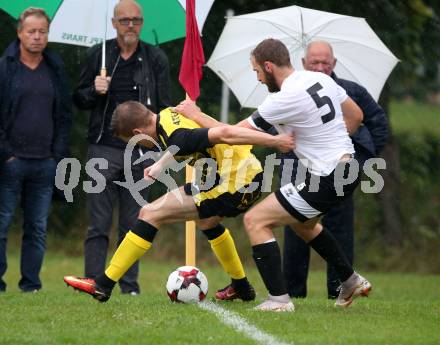 Fussball 1. Klasse D. Griffen gegen Haimburg. Vinzenz Martin Benger, (Griffen),  Michael Dobrounig  (Haimburg). Griffen, am 1.9.2018.
Foto: Kuess
---
pressefotos, pressefotografie, kuess, qs, qspictures, sport, bild, bilder, bilddatenbank