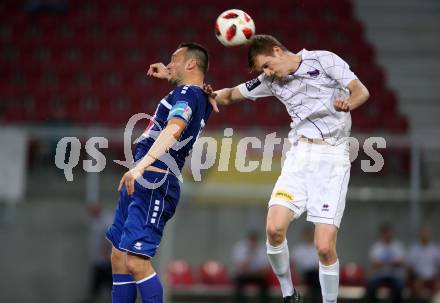 Fussball 2. Liga. SK Austria Klagenfurt gegen SC Wiener Neustadt. Scott Fitzgerald Kennedy, (Austria Klagenfurt),  Hamdi Salihi  (Wiener Neustadt). Klagenfurt, am 23.9.2018.
Foto: Kuess
---
pressefotos, pressefotografie, kuess, qs, qspictures, sport, bild, bilder, bilddatenbank