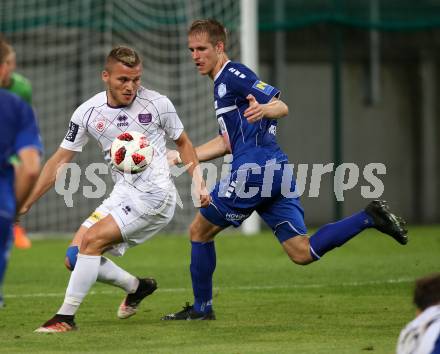 Fussball 2. Liga. SK Austria Klagenfurt gegen SC Wiener Neustadt. Volkan Akyildiz,  (Austria Klagenfurt),  Stefan Hager (Wiener Neustadt). Klagenfurt, am 23.9.2018.
Foto: Kuess
---
pressefotos, pressefotografie, kuess, qs, qspictures, sport, bild, bilder, bilddatenbank