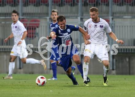 Fussball 2. Liga. SK Austria Klagenfurt gegen SC Wiener Neustadt. Markus Rusek,  (Austria Klagenfurt), Nico Gorzel  (Wiener Neustadt). Klagenfurt, am 23.9.2018.
Foto: Kuess
---
pressefotos, pressefotografie, kuess, qs, qspictures, sport, bild, bilder, bilddatenbank